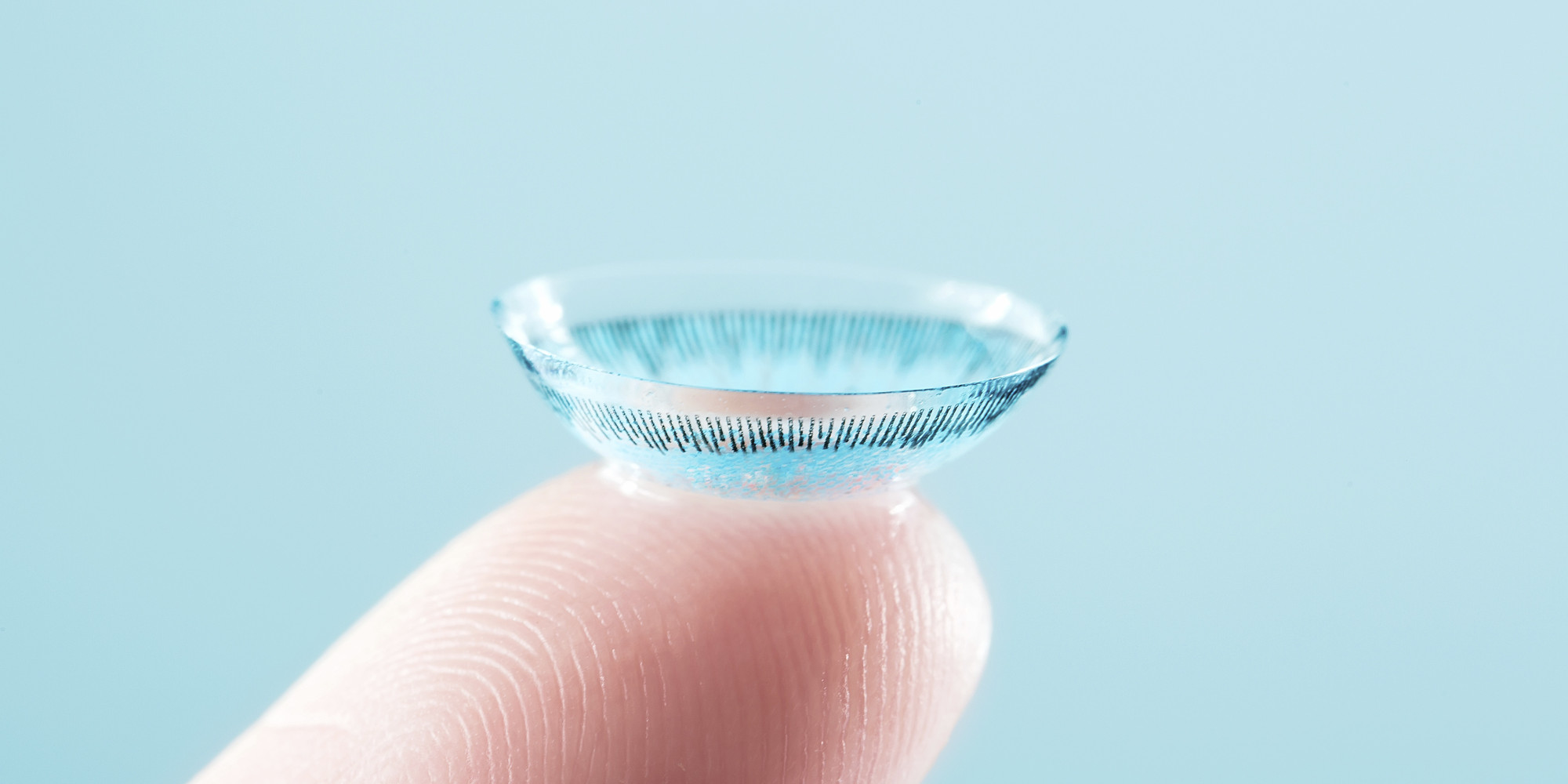 contact lens on finger